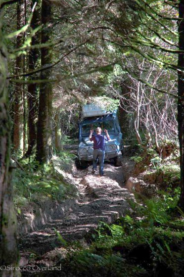 James guides the 90 down a muddy descent