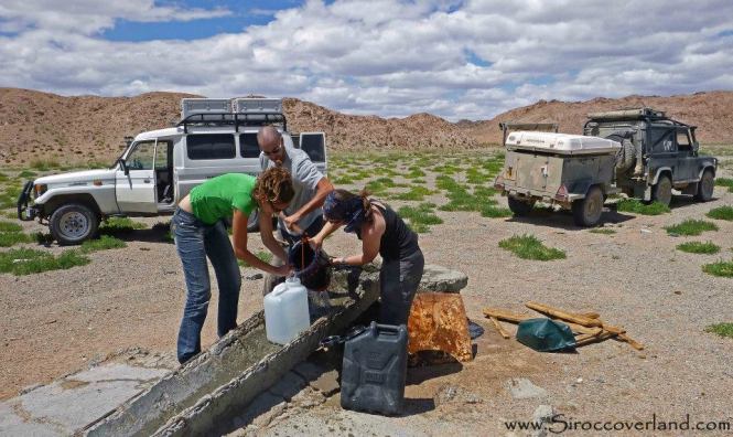 Topping up. Wells were located on our old Soviet maps with details on recharge rate L/Hr. However only about 1 in 5 were still operational.