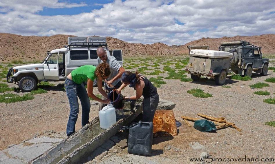 Mongolia, Gobi Desert, Water, well, refilling, fresh, overland, adventure, supplies, land rover, defender, 90, trailer