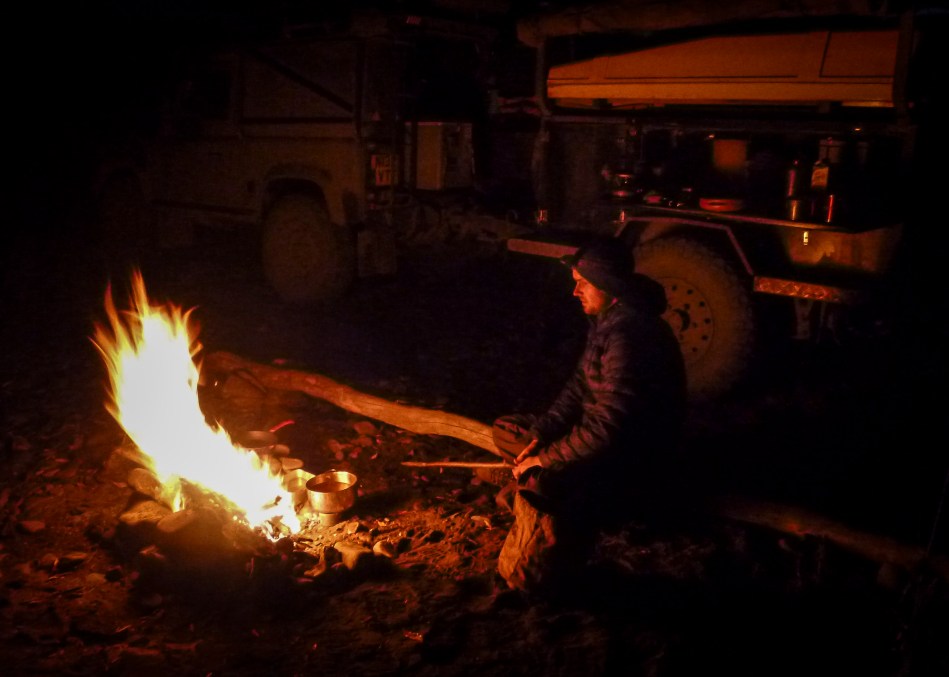 fire, road of bones, land rover, defender, 90, overland, expediton